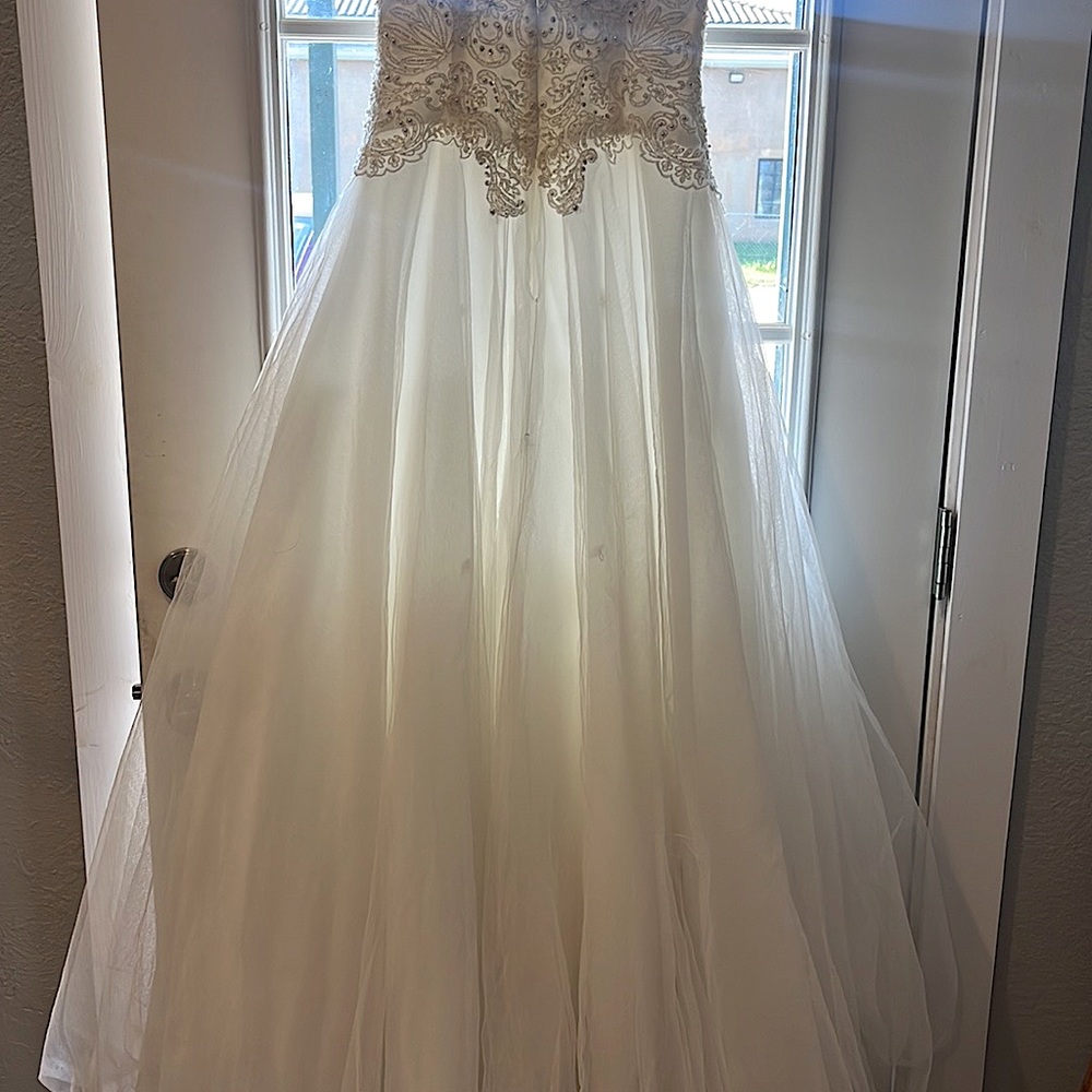 David’s Bridal lace bodice and tulle skirt.  Sold as is.